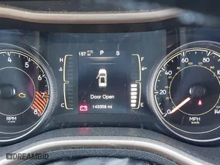 2014 Jeep Cherokee Latitude with VIN 1C4PJMCS6EW145810, listed as a IAAI auction lot 41802031 with 143,358 mi miles. Bid and sale history available at carsss.com. Image 7.