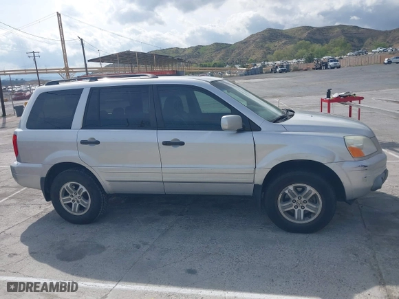 2005 Honda Pilot EX-L with NAVI with VIN 2HKYF18755H552502, listed as a IAAI auction lot 41921122 with 187,904 mi miles. Bid and sale history available at carsss.com. Image 13.