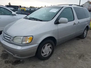 2001 Toyota Sienna LE with VIN 4T3ZF13C91U348233, listed as a IAAI auction lot 41529446 with 223,617 mi miles. Bid and sale history available at carsss.com. Image 2.