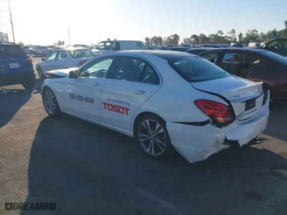 2015 Mercedes-Benz C-Class C 300 with VIN 55SWF4JB3FU074019, listed as a IAAI auction lot 40774389 with 104,091 mi miles. Bid and sale history available at carsss.com. Image 3.