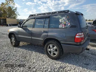 2003 Toyota Land Cruiser with VIN JTEHT05J932044630, listed as a Copart auction lot 76836364 with 215,802 mi miles and Salvage Title. Bid and sale history available at carsss.com. Image 2.