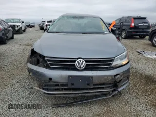 2015 Volkswagen Jetta SE with VIN 3VWD17AJ9FM329149, listed as a Copart auction lot 59561285 with 111,552 mi miles and Salvage title. Bid and sale history available at DreamBid. Image 5.