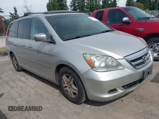 2005 Honda Odyssey EX-L with VIN 5FNRL38735B017322, listed as a IAAI auction lot 42760668 with 252,596 mi miles and . Bid and sale history available at DreamBid. Image 1.