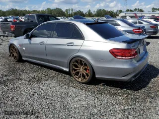 2014 Mercedes-Benz E-Class E 63 AMG S-Model with VIN WDDHF7GB7EA910740, listed as a Copart auction lot 73857184 with 115,493 mi miles and Salvage Title. Bid and sale history available at carsss.com. Image 2.
