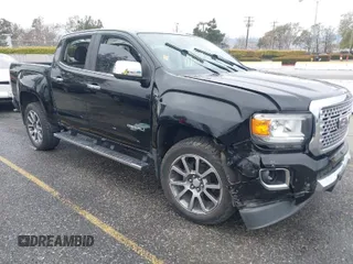 2018 GMC Canyon 4WD Denali with VIN 1GTG6EEN7J1318059, listed as a IAAI auction lot 41772860 with 80,230 mi miles. Bid and sale history available at carsss.com. Image 1.