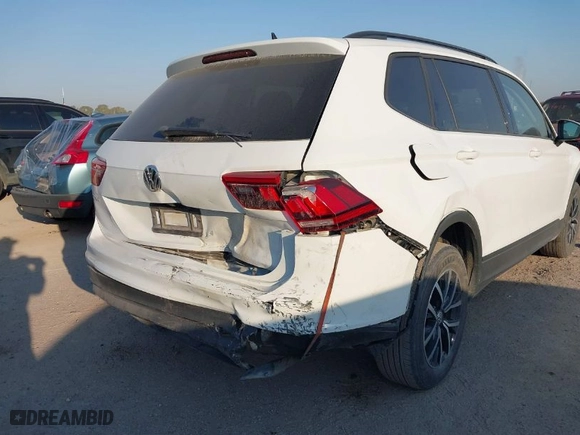 2021 Volkswagen Tiguan S with VIN 3VV1B7AX1MM002556, listed as a IAAI auction lot 40592120 with 55,222 mi miles. Bid and sale history available at carsss.com. Image 6.