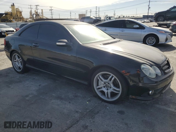 2009 Mercedes-Benz CLK 550 with VIN WDBTJ72H69F266105, listed as a Copart auction lot 79723224 with 114,840 mi miles and Salvage Title. Bid and sale history available at DreamBid. Image 4.