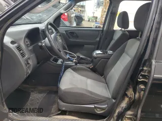 2005 Ford Escape XLS Value with VIN 1FMYU92Z05DA10448, listed as a Copart auction lot 54438955 with 185,303 mi miles and Salvage title. Bid and sale history available at DreamBid. Image 7.