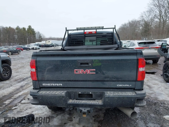 2019 GMC Sierra 2500HD Denali with VIN 1GT12SEY1KF229134, listed as a IAAI auction lot 41641498 with 97,691 mi miles. Bid and sale history available at carsss.com. Image 16.