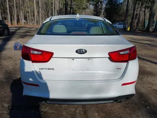 2015 Kia Optima LX with VIN 5XXGM4A79FG367783, listed as a IAAI auction lot 41357754 with 130,197 mi miles and . Bid and sale history available at DreamBid. Image 16.