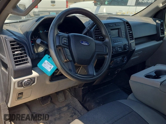 2018 Ford F-150 XL with VIN 1FTMF1EB9JKD38518, listed as a IAAI auction lot 42730627 with 205,804 mi miles and . Bid and sale history available at DreamBid. Image 9.