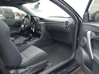 2015 Scion tC with VIN JTKJF5C79FJ003404, listed as a IAAI auction lot 41756024 with 128,906 mi miles. Bid and sale history available at carsss.com. Image 5.