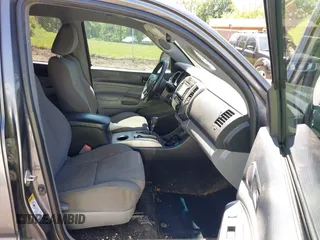 2014 Toyota Tacoma with VIN 5TFLU4ENXEX103129, listed as a IAAI auction lot 42230976 with 191,982 mi miles and . Bid and sale history available at DreamBid. Image 5.