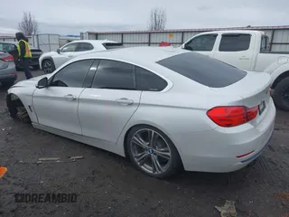 2016 BMW 4 Series 428i xDrive with VIN WBA4C9C54GG135615, listed as a IAAI auction lot 41655368 with 156,851 mi miles and . Bid and sale history available at carsss.com. Image 3.