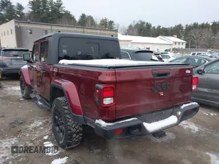 2021 Jeep Gladiator Willys with VIN 1C6HJTAG6ML571081, listed as a IAAI auction lot 41368902 with 45,077 mi miles and . Bid and sale history available at DreamBid. Image 14.