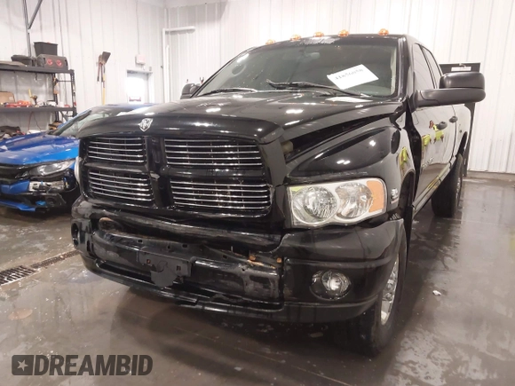 2005 Dodge Ram 3500 SLT with VIN 3D7LS38C85G810265, listed as a IAAI auction lot 41856058 with 164,027 mi miles. Bid and sale history available at carsss.com. Image 6.