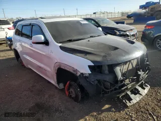 2015 Jeep Grand Cherokee SRT with VIN 1C4RJFDJ8FC687469, listed as a Copart auction lot 85270104 with 0 mi miles and Salvage Title. Bid and sale history available at carsss.com. Image 4.