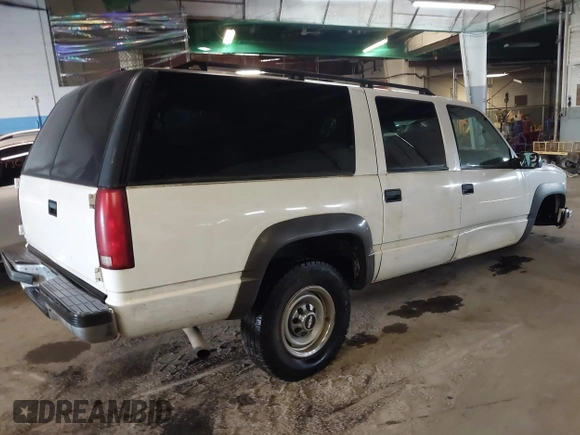 1997 Chevrolet Suburban with VIN 3GNGK26R2VG154004, listed as a IAAI auction lot 42255578 with 213,345 mi miles and . Bid and sale history available at DreamBid. Image 4.