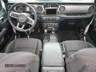 2023 Jeep Gladiator Overland z VIN 1C6HJTFG6PL516742, wystawiony jako Copart lot #65762465 z przebiegiem Nie podano mil oraz Szkoda całkowita • Salvage title. Historia ofert i sprzedaży dostępna na DreamBid. Obrazek 8.