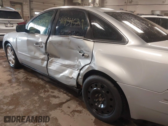 2005 Ford Five Hundred Limited with VIN 1FAFP251X5G108410, listed as a IAAI auction lot 41934529 with 118,202 mi miles and . Bid and sale history available at DreamBid. Image 6.