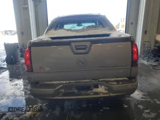 2004 Cadillac Escalade EXT z VIN 3GYEK62N34G324955, wystawiony jako Copart lot #87479764 z przebiegiem 218 127 mil mil oraz Szkody całkowita. Historia ofert i sprzedaży dostępna na DreamBid. Obrazek 6.