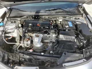 2023 Honda Civic Sport z VIN 2HGFE2F57PH509181, wystawiony jako Copart lot #57286025 z przebiegiem Nie podano mil oraz Szkoda całkowita • Salvage title. Historia ofert i sprzedaży dostępna na DreamBid. Obrazek 11.