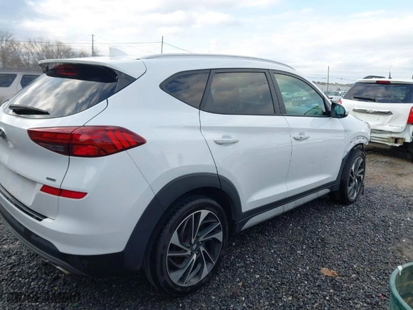 2020 Hyundai Tucson SEL with VIN KM8J3CAL5LU231183, listed as a IAAI auction lot 41509330 with 127,440 mi miles. Bid and sale history available at carsss.com. Image 4.