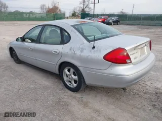 2003 Ford Taurus SES Standard with VIN 1FAFP55203A177634, listed as a IAAI auction lot 41804419 with 72,863 mi miles. Bid and sale history available at carsss.com. Image 3.