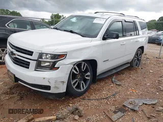 2018 Chevrolet Tahoe LT z VIN 1GNSKBKC9JR132670, wystawiony jako IAAI lot #42248273 z przebiegiem 136 636 mil mil oraz . Historia ofert i sprzedaży dostępna na DreamBid. Obrazek 2.
