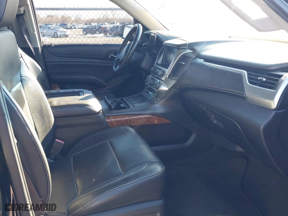 2015 Chevrolet Tahoe LTZ with VIN 1GNSCCKC8FR581994, listed as a IAAI auction lot 41406219 with 187,802 mi miles. Bid and sale history available at carsss.com. Image 5.