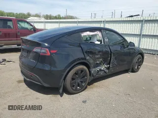 2023 Tesla Model Y Long Range z VIN 7SAYGDEE9PA115279, wystawiony jako Copart lot #55018275 z przebiegiem 43 026 mil mil oraz Szkoda całkowita • Salvage title. Historia ofert i sprzedaży dostępna na DreamBid. Obrazek 3.