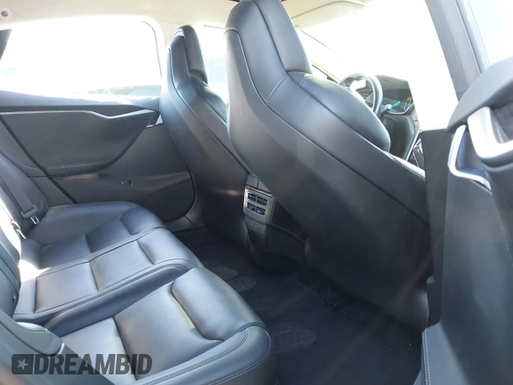 2018 Tesla Model S 75D with VIN 5YJSA1E29JF263418, listed as a IAAI auction lot 41682037 with 84,764 mi miles and . Bid and sale history available at DreamBid. Image 8.