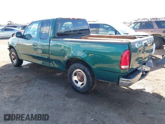2000 Ford F-150 XL with VIN 1FTRX17L0YKA94650, listed as a IAAI auction lot 41720452 with 112,013 mi miles. Bid and sale history available at carsss.com. Image 3.