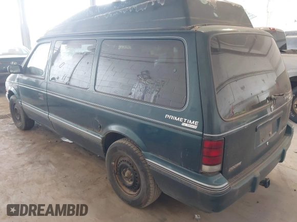1995 Dodge Caravan Grand SE with VIN 1B4GH44R3SX566801, listed as a IAAI auction lot 42699597 with 103,069 mi miles and . Bid and sale history available at DreamBid. Image 3.