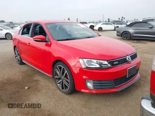 2014 Volkswagen Jetta GLI z VIN 3VW4T7AJ2EM246347, wystawiony jako IAAI lot #42553341 z przebiegiem 140 793 mil mil oraz . Historia ofert i sprzedaży dostępna na DreamBid. Obrazek 1.