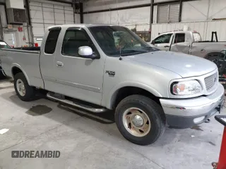 2000 Ford F-150 XL with VIN 1FTRX18L4YNB66317, listed as a IAAI auction lot 41932247 with 1 mi miles. Bid and sale history available at carsss.com. Image 1.