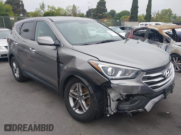 2018 Hyundai Santa Fe 2.4L with VIN 5XYZT3LB7JG569517, listed as a IAAI auction lot 42141100 with 57,854 mi miles and . Bid and sale history available at DreamBid. Image 1.