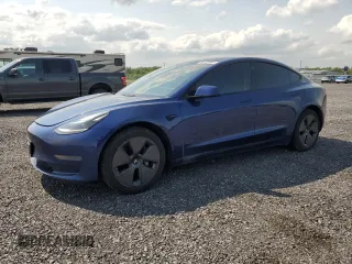 2022 Tesla Model 3 z VIN 5YJ3E1EAXNF202598, wystawiony jako Copart lot #57094815 z przebiegiem 157 850 mil mil oraz Czysty tytuł • Clean title. Historia ofert i sprzedaży dostępna na DreamBid. Obrazek 1.
