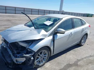 2018 Ford Focus SE with VIN 1FADP3F23JL315341, listed as a IAAI auction lot 41834939 with 121,686 mi miles. Bid and sale history available at carsss.com. Image 17.