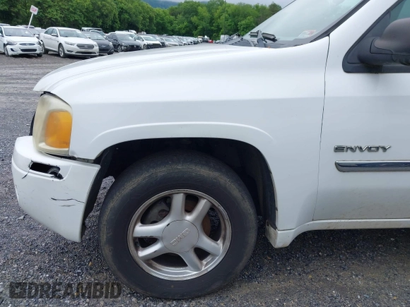2006 GMC Envoy SLE z VIN 1GKDT13S562116159, wystawiony jako IAAI lot #42361666 z przebiegiem 243 466 mil mil oraz . Historia ofert i sprzedaży dostępna na DreamBid. Obrazek 14.
