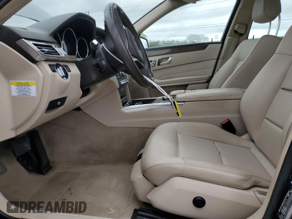 2014 Mercedes-Benz E 350 Luxury with VIN WDDHH8JB6EA809262, listed as a Copart auction lot 51817555 with 122,948 mi miles and Salvage Title. Bid and sale history available at DreamBid. Image 7.