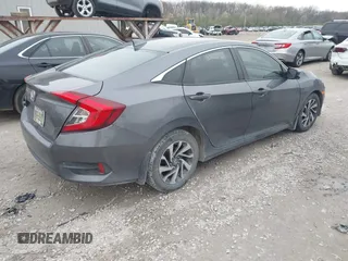 2018 Honda Civic EX with VIN 2HGFC2F79JH570403, listed as a IAAI auction lot 42018123 with 165,821 mi miles and . Bid and sale history available at DreamBid. Image 4.