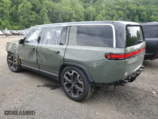 2022 Rivian R1S Launch Edition with VIN 7PDSGABL7NN001893, listed as a Copart auction lot 58809684 with 19,067 mi miles and Salvage Title. Bid and sale history available at carsss.com. Image 2.