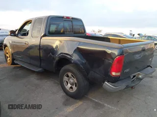 1999 Ford F-150 XL with VIN 1FTRX17L3XKB32547, listed as a IAAI auction lot 41331882 with Not Provided miles. Bid and sale history available at carsss.com. Image 3.