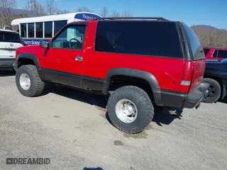 1999 Chevrolet Tahoe with VIN 3GNEK18R7XG189820, listed as a IAAI auction lot 41631906 with 212,720 mi miles. Bid and sale history available at carsss.com. Image 3.