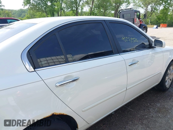 2008 Kia Optima LX z VIN KNAGE124785217238, wystawiony jako IAAI lot #42272576 z przebiegiem 186 610 mil mil oraz . Historia ofert i sprzedaży dostępna na DreamBid. Obrazek 13.