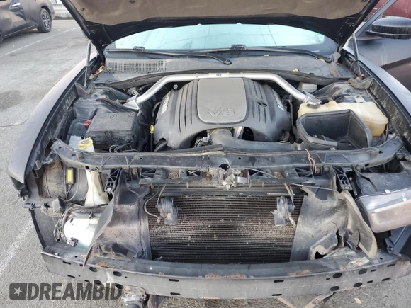 2011 Dodge Charger RT Plus with VIN 2B3CM5CT6BH517548, listed as a Copart auction lot 82219834 with 114,134 mi miles and Salvage Title. Bid and sale history available at carsss.com. Image 11.