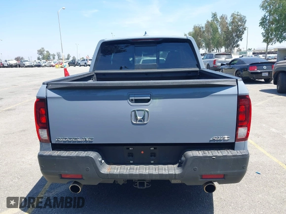 2022 Honda Ridgeline RTL-E z VIN 5FPYK3F78NB028776, wystawiony jako IAAI lot #42077805 z przebiegiem 22 971 mil mil oraz . Historia ofert i sprzedaży dostępna na DreamBid. Obrazek 17.
