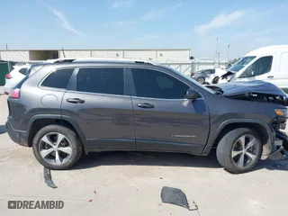 2020 Jeep Cherokee Limited with VIN 1C4PJMDX0LD606891, listed as a IAAI auction lot 41743197 with 155,256 mi miles. Bid and sale history available at carsss.com. Image 13.