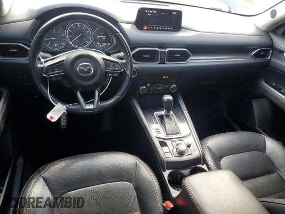 2017 Mazda CX-5 Grand Touring with VIN JM3KFBDL2H0197831, listed as a Copart auction lot 43150335 with 126,847 mi miles and Salvage Title. Bid and sale history available at carsss.com. Image 8.